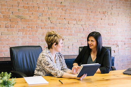 Two women talking in Photo by Amy Hirschi on Unsplash.jpg