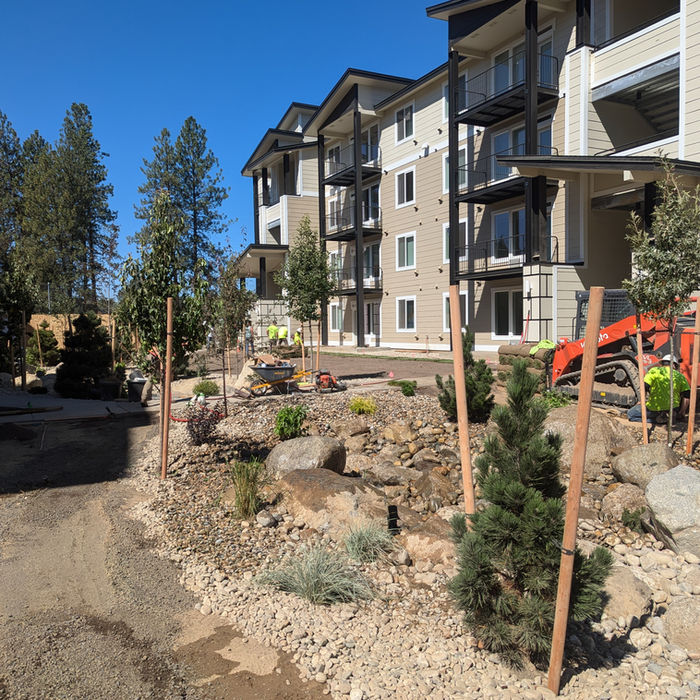 Commercial site preparation in progress for a multifamily construction project.