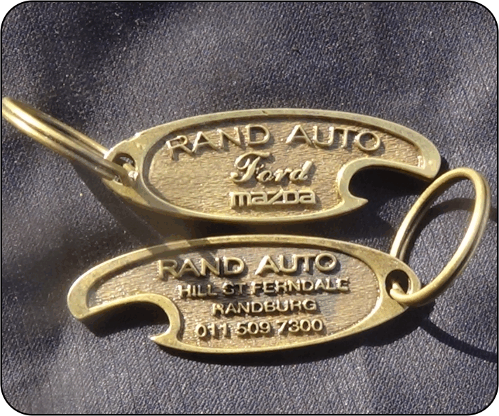 Bottle opener Brass Antique plating with logo engraved on one side and company information on the reverse