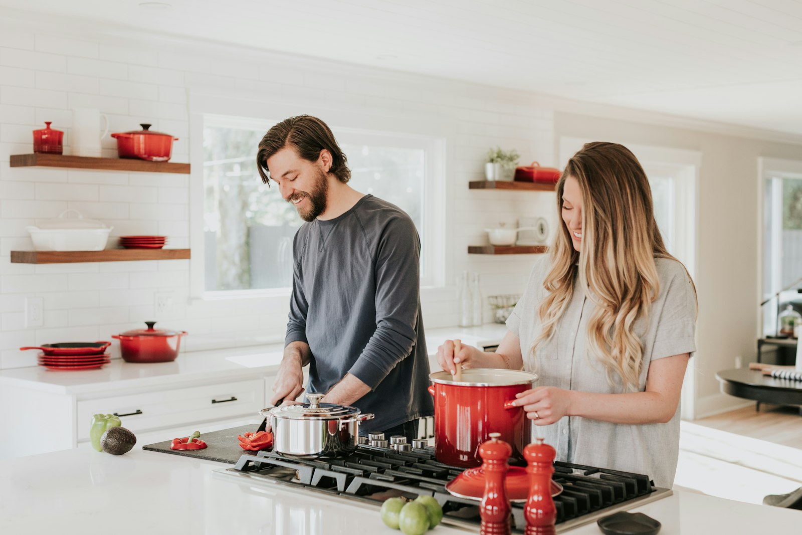 Couple making up after an argument, kitchen at night