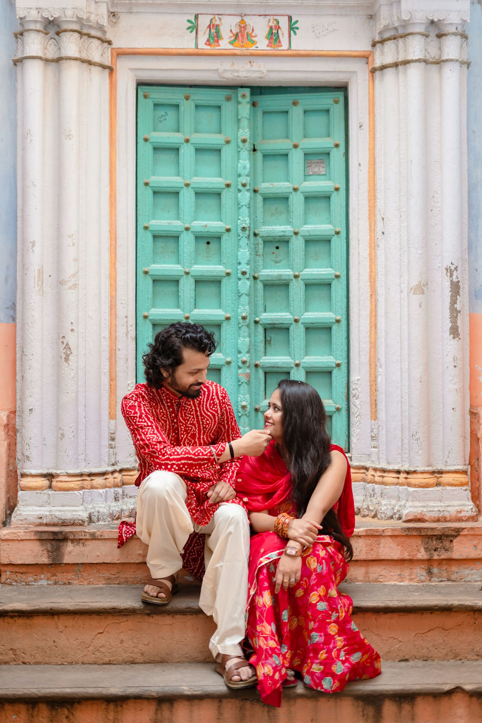 Young couple talking over chai