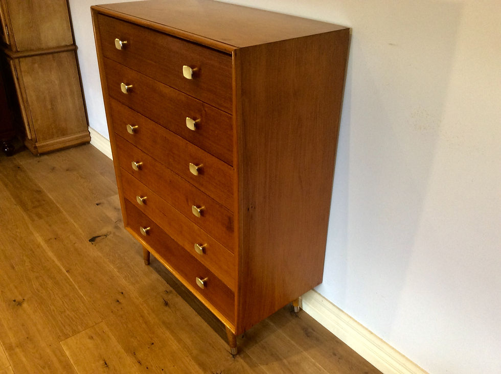 Thumbnail: Mid Century Teak Alrob Six Drawer Tallboy with Splayed Atomic Legs.