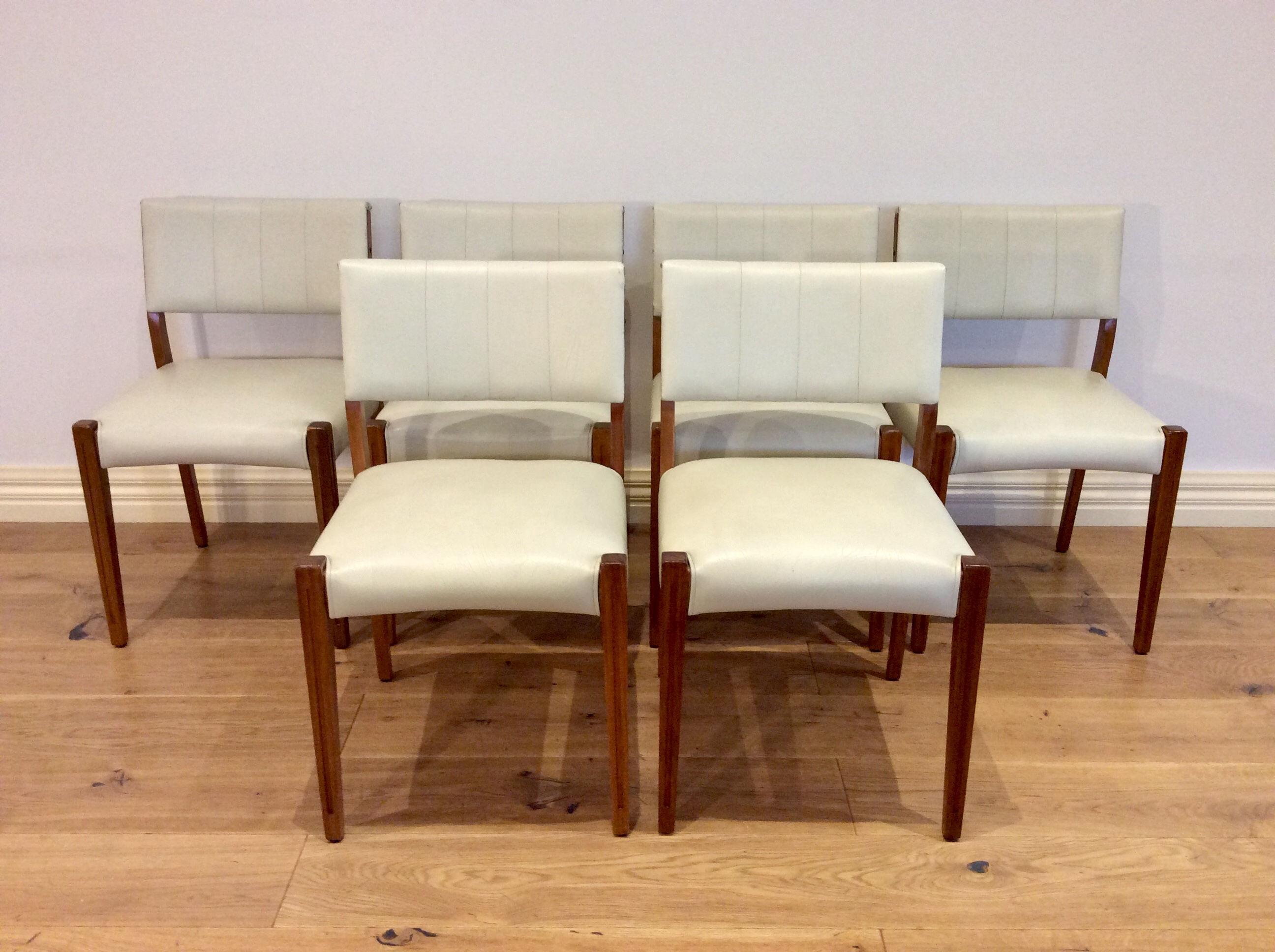1960s Teak Dining Chairs with White Leather Upholstery.