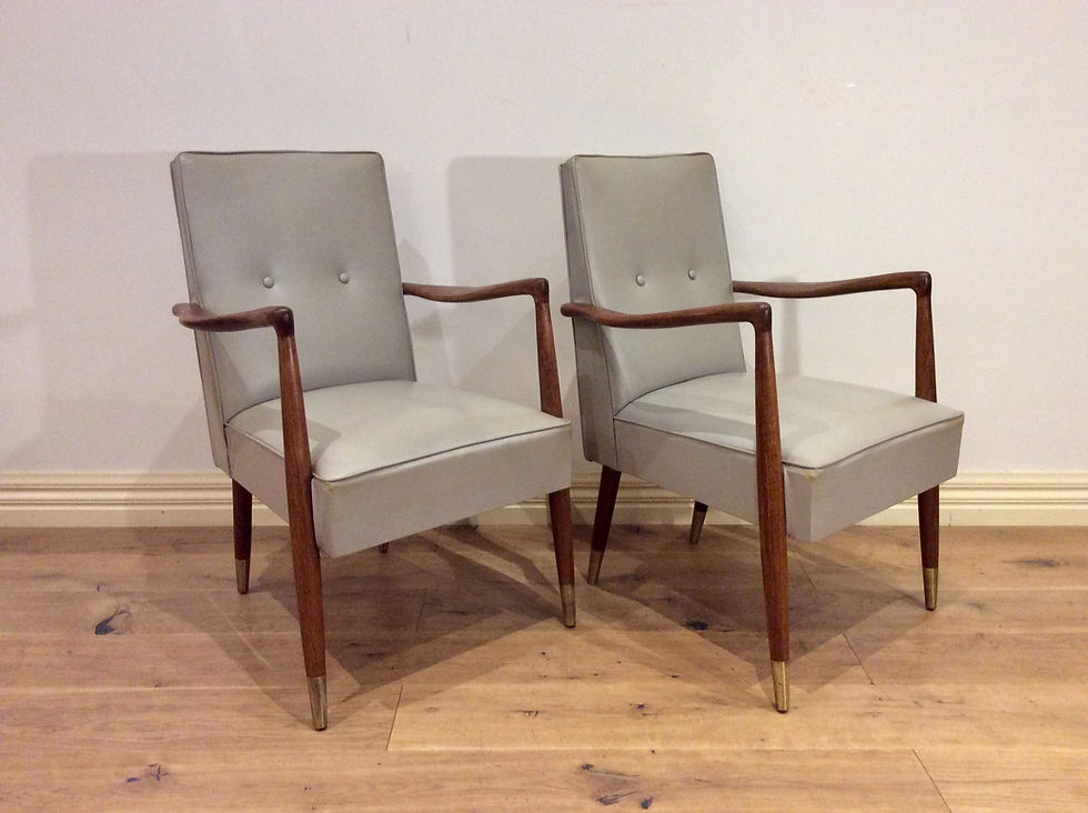Matching Pair of Mid Century Blackwood and Vinyl Armchairs. Circa 1960.
