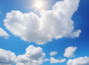 big blue sky with white puffy clouds.jpg