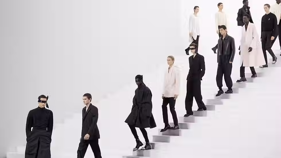 "Procession finale shows Anderson’s softened silhouettes: cropped jackets, wide trousers and untucked shirting in muted pastels." Credit: Dior press.