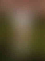 Model in blue and white striped swimsuit with white fringed jacket, tall lace-up boots, and leg warmers at Sinead Gorey SS26