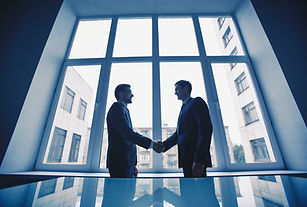graphicstock-photo-of-successful-businessmen-handshaking-after-striking-deal_SgPIo3OlgZ.jp
