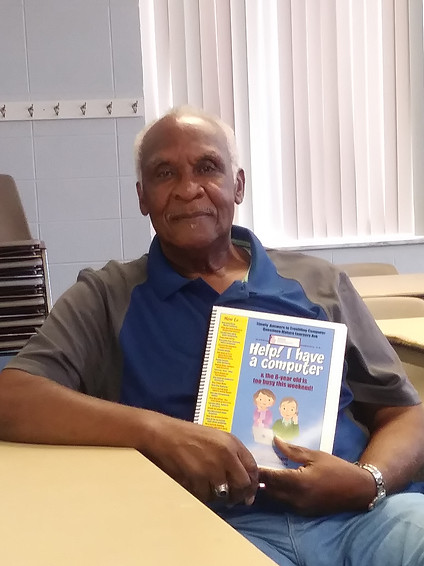 Senior man in computer class