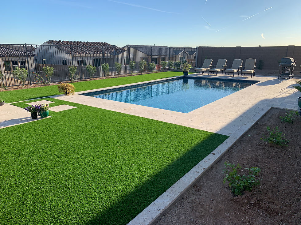 Artificial Turf and Travertine Pool Deck