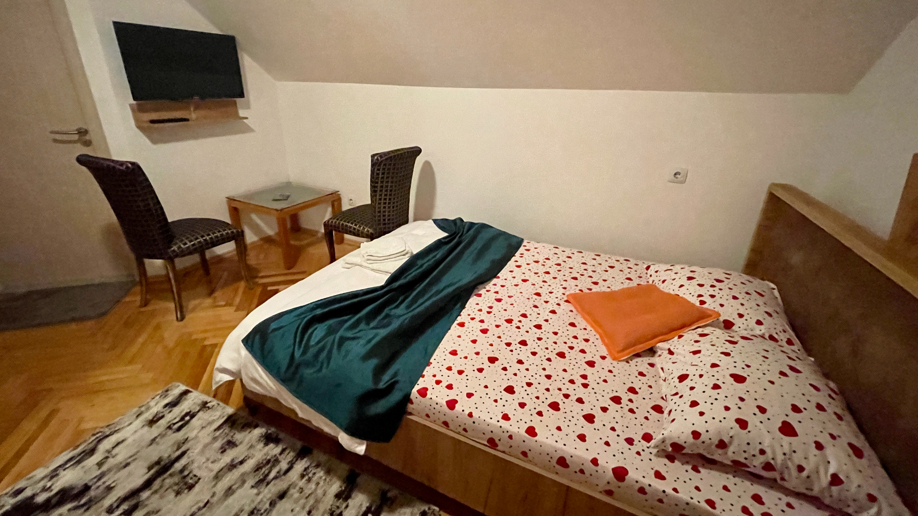 Room 201 double bedroom with a seating area