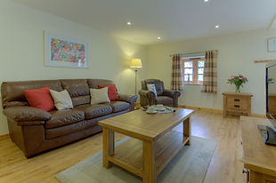 a comfortable living room in The Granary