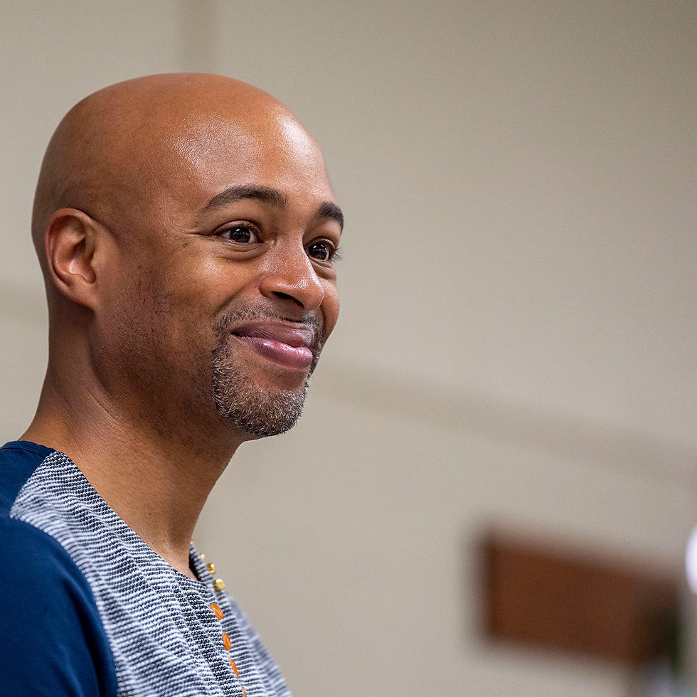 Micah McCarey hosts a community welcome event for the Racial Equity Coalition at Athens Middle School. Photo by Pearl Spurlock.