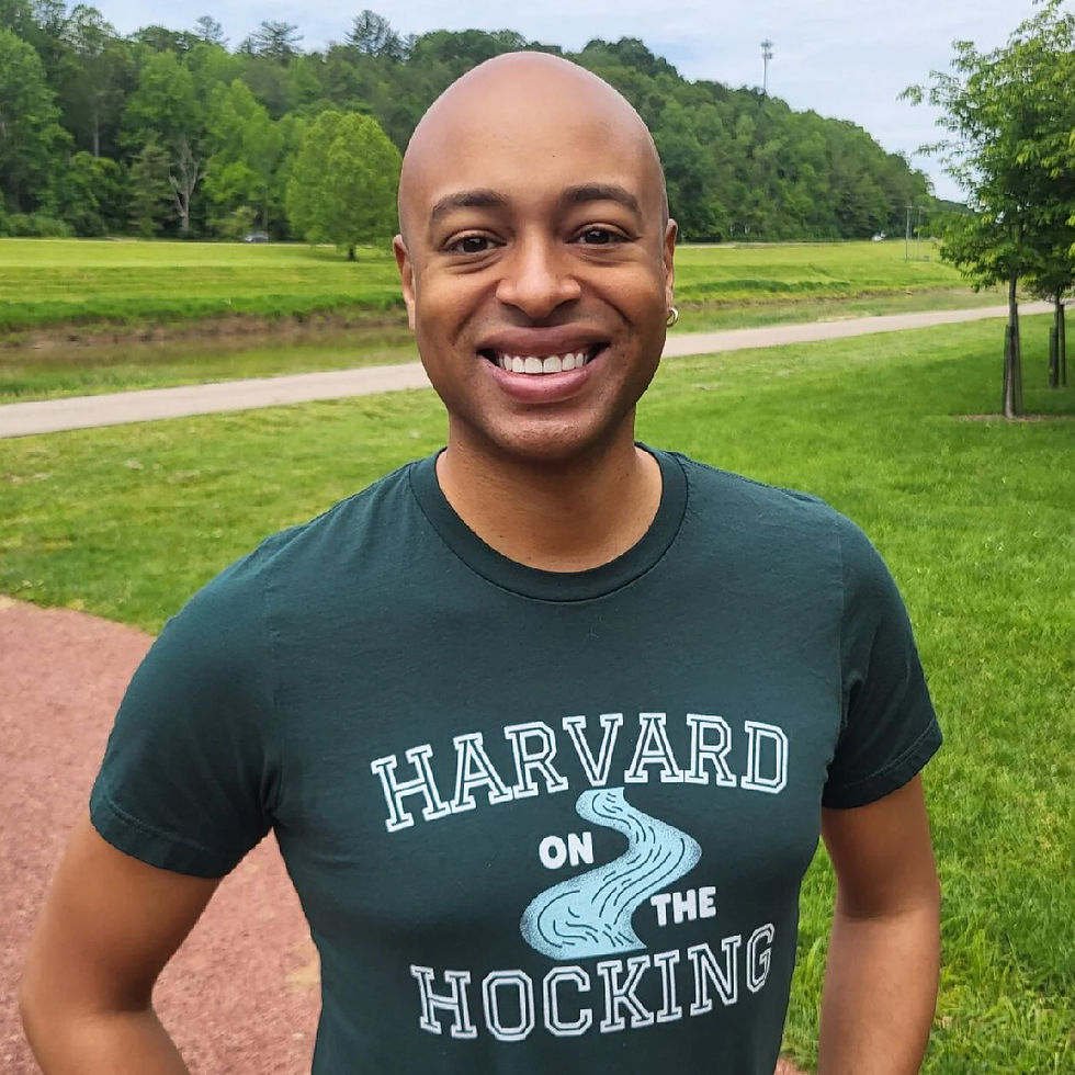 Athens City Council Member Micah McCarey poses for a photo wearing a tee shirt that says “Harvard on the Hocking.” He told The Athens Messenger on May 27 that he is looking forward to bringing information back to Athens from the Harvard Senior Executives in State and Local Government program in June.