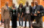 Nick Mudimba (in specs) with his colleagues at the African Union headquarters in Addis Ababa, Ethiopia. [PHOTO: CGTN]