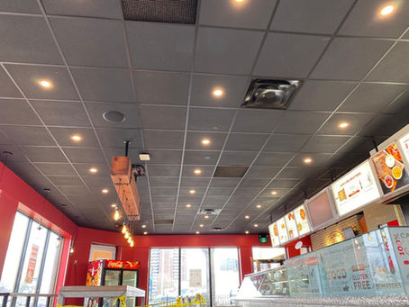 Gamtani Construction Corporation Enhances Pizzeria with a Stunning Black Drop Ceiling