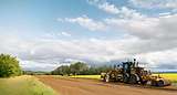 Grader_CountyRoad_WideShot.png