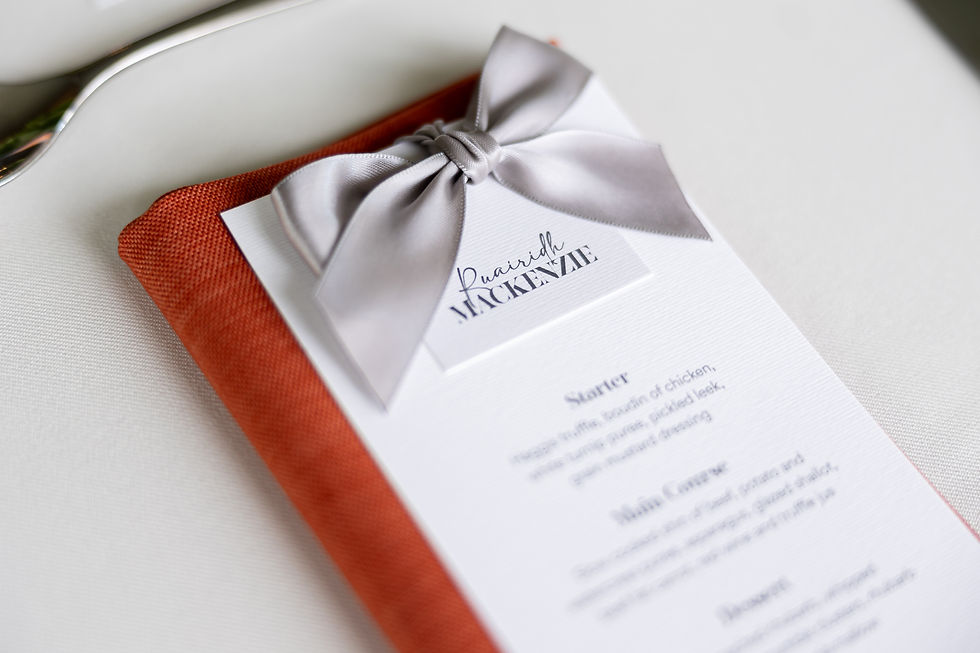 Menu and Place Name tied with ribbon