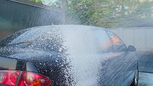 washing-luxury-black-car-on-touchless-car-wash-cleaning-the-details-of-car-washing-sedan-c