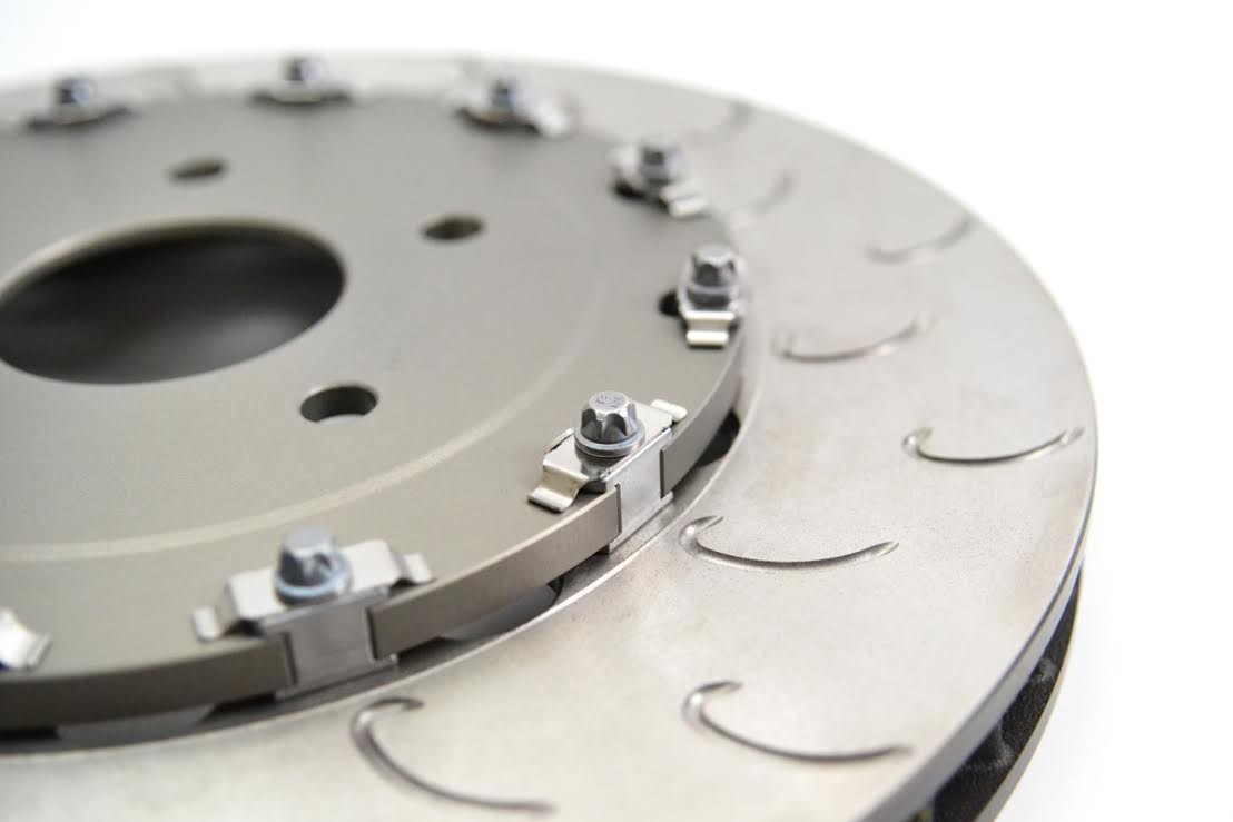 Close-up of floating disc bobbins constraining the rotor to the bell while allowing relative thermal expansion movement