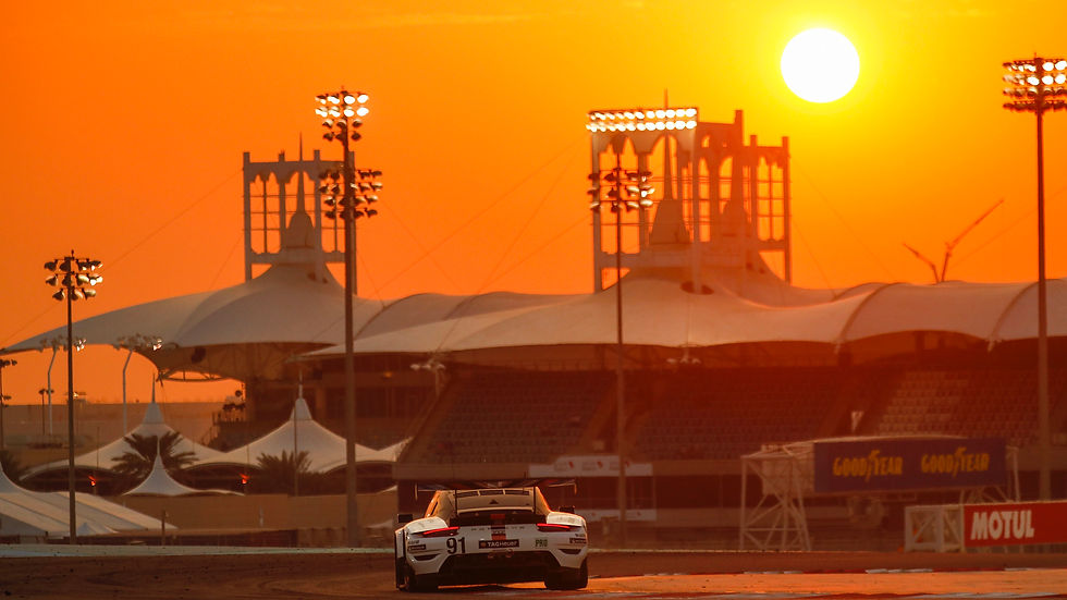 911 LMGTE cornering under sunset in Bahrain