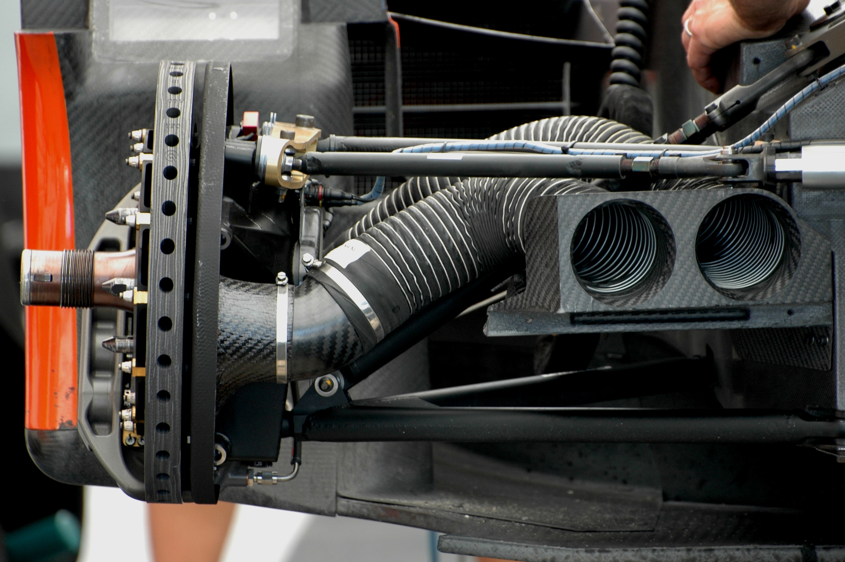Figure 2: Brake cooling duct routed from the disassembled front of a Le Mans prototype race car to the front brake rotor assembly