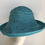 Thumbnail: Myrna   (folded paper turquoise)