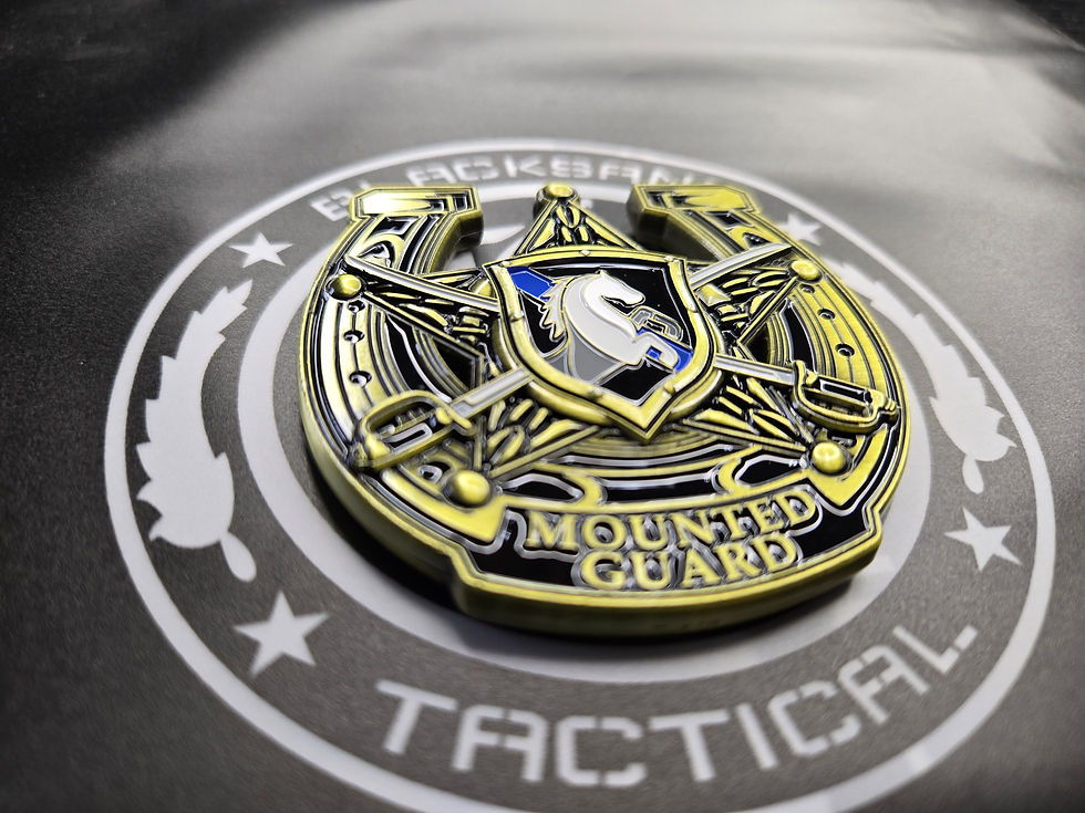 Mounted Guard emblem with horse head, crossed sabers, and laurel wreath.