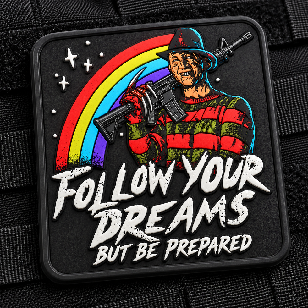 Dreams & Nightmares PVC patch with horror character, rifle and rainbow.
