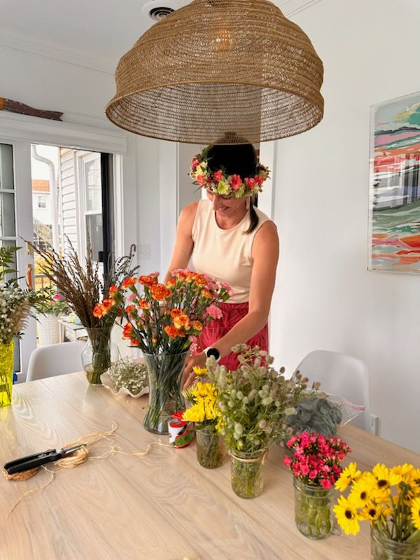 Preparing the flower bar at a private workshop