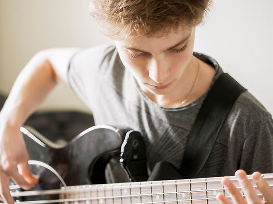Teenger Playing Guitar