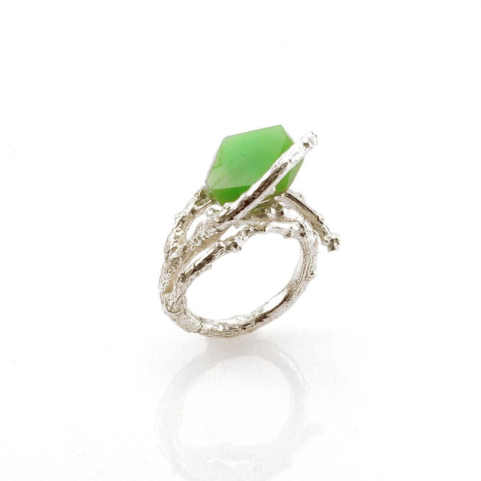 Thumbnail: Silver ring made from a casted branch holding a green chrysoprase mineral stone