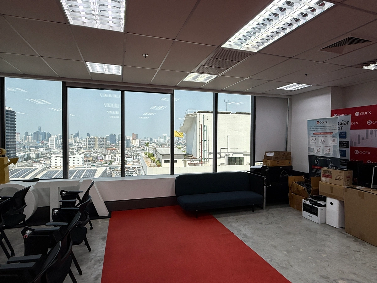 Existing GOFX seminar area used for event equipment and backdrop storage before the space was reorganised and redesigned.