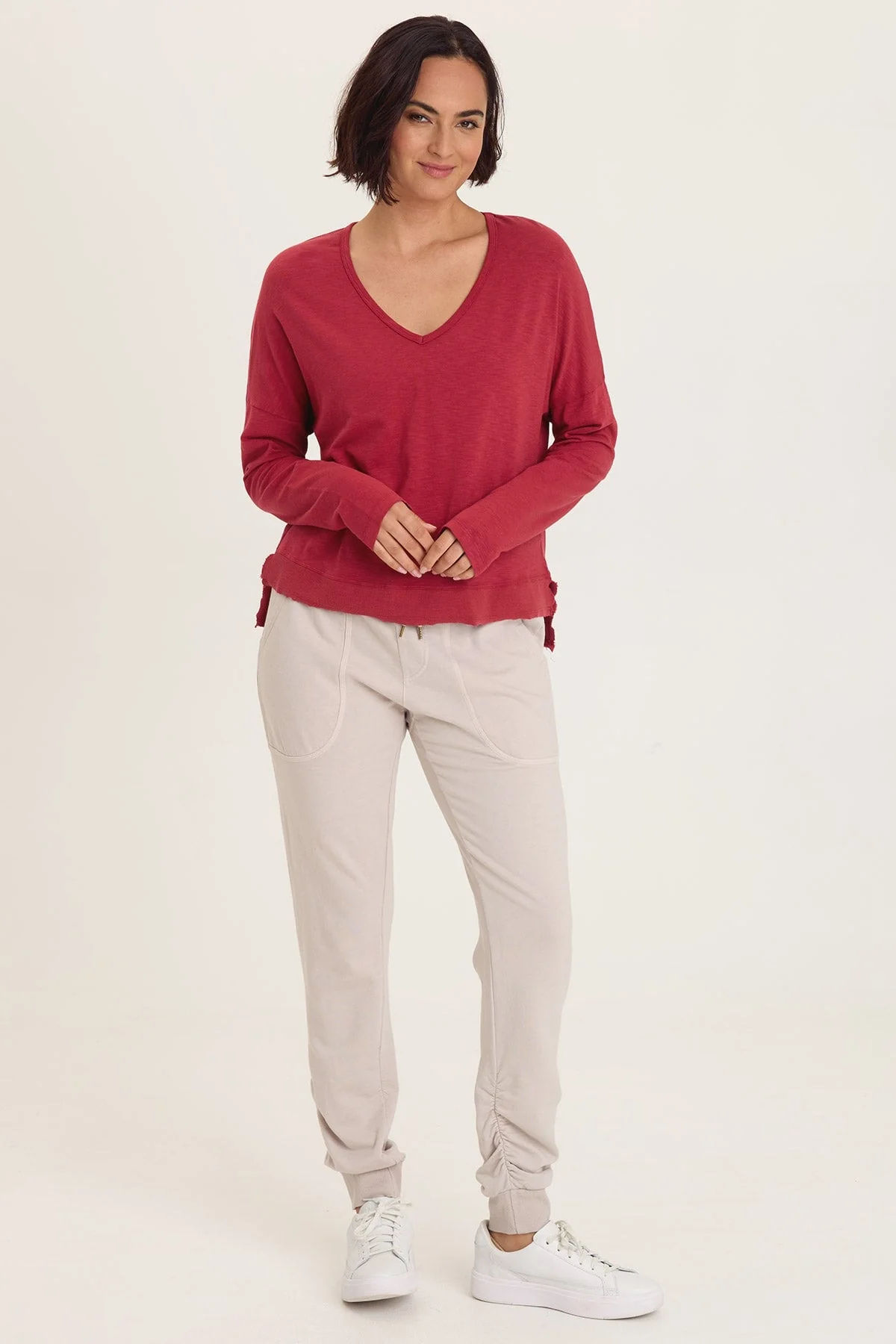 WEARABLES ODILIA HIGH-LOW LONG SLEEVE V-NECK TOP In Corundum