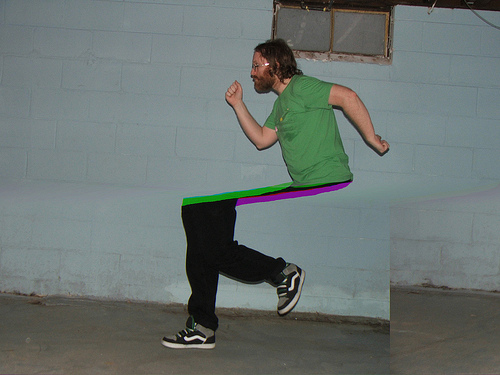 Man running with his upper body detached from his legs.