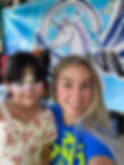 Artist and kid wit face painting