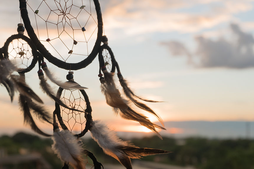 Dream Catcher on the sunset background.jpg