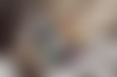 A luxurious flat lay of Virgo birthstones on a soft ivory linen background - featuring blue sapphire, carnelian, emerald, peridot, jade, and amethyst - each crystal glowing gently with earthy, calming energy. Accented with pressed herbs, dried lavender, handwritten journal pages, and delicate gold jewelry.