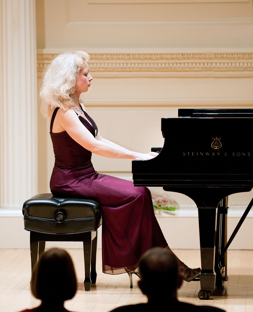 Sophia Agranovich performs a solo concert dedicated to the Bicentennial of Franz Liszt at Carnegie Hall.