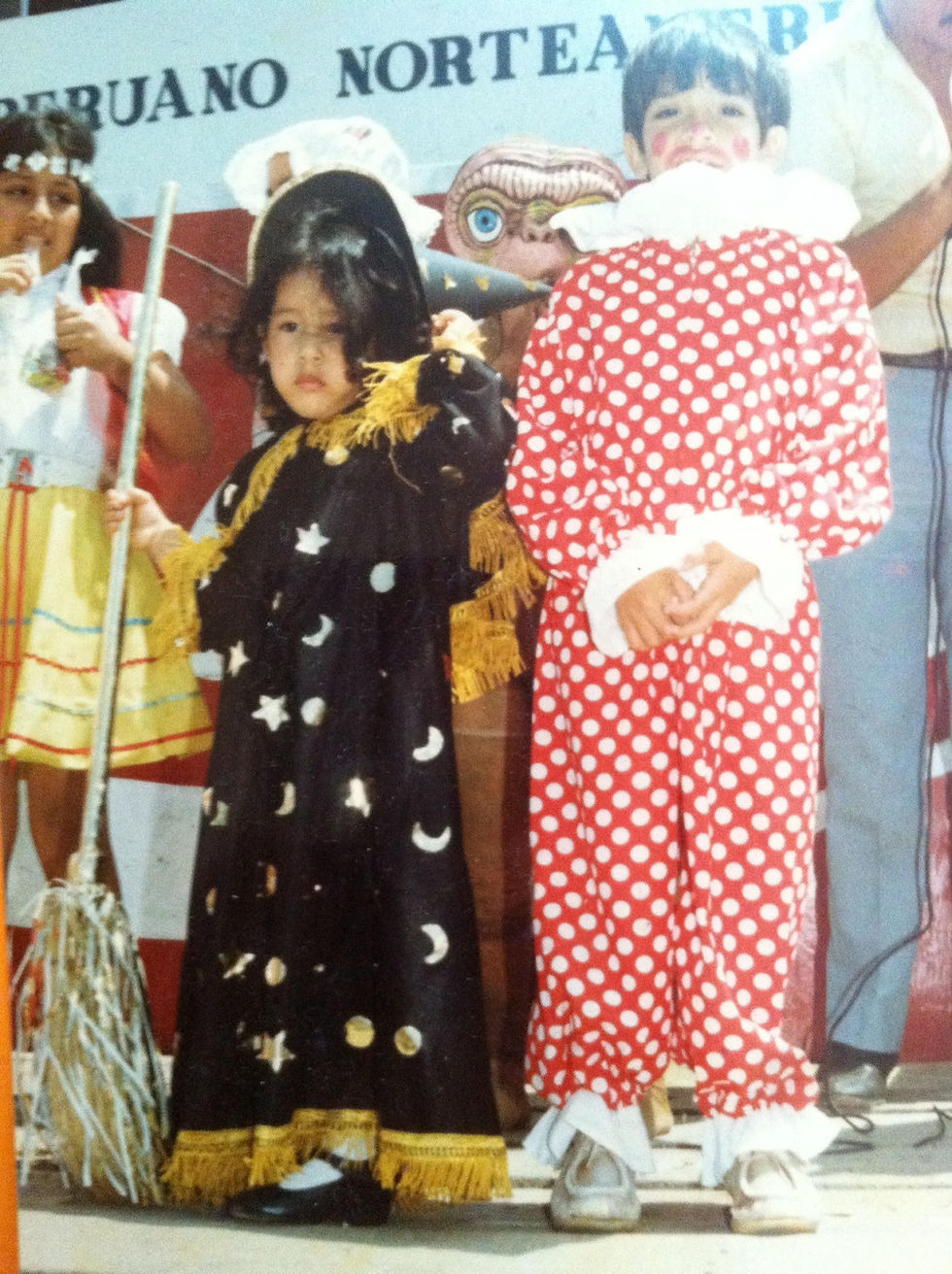 Flor performing in a school event in Peru