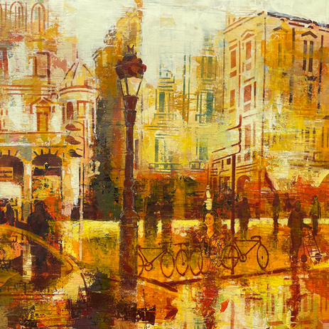 Textured urban landscape painting of a European city street in golden light, featuring warm yellow and amber tones in Phil Davis's signature Architecturalism style.