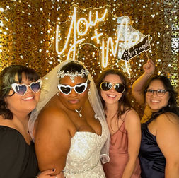 Wedding guests and bride sharing photo together at the Georgetown Community Center
