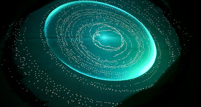 bright aqua swirl in starfield