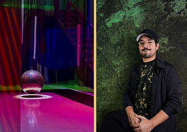 Photograph of colorful art installation with a disco ball in the center and a portrait photograph of a man with glasses and a black baseball cap.