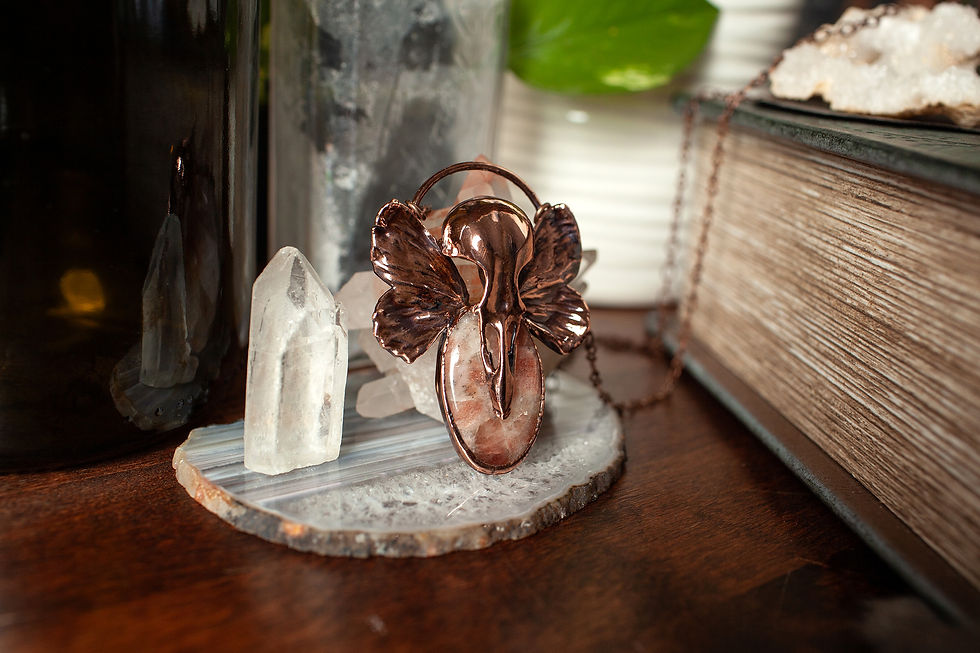 Thumbnail: Sunstone Bird Skull Necklace