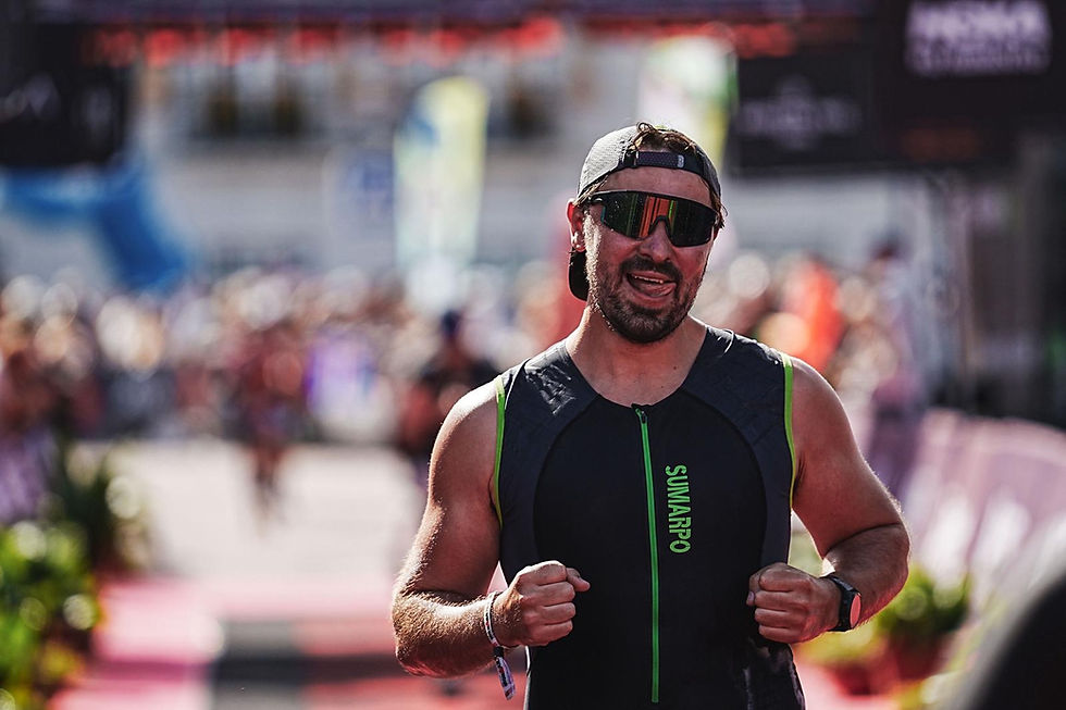 Client competing in Portugal Ironman 70.3