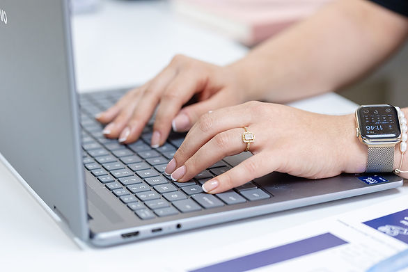 Varnel Serivces and training client on their laptop