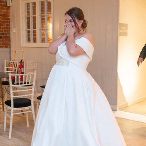 Evening wedding celebrations at Sopley Mill with fire pit, fairy lights and choir performance.