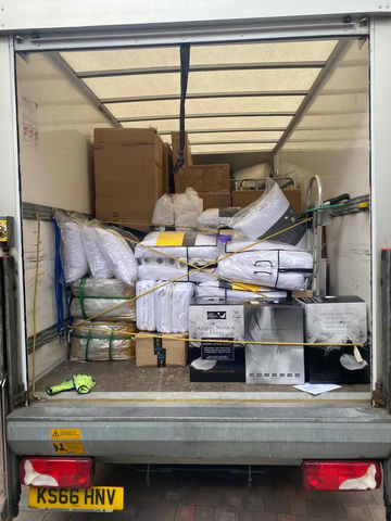 Move with Moreno Man with a van. Luton Box Van being loaded. Image.