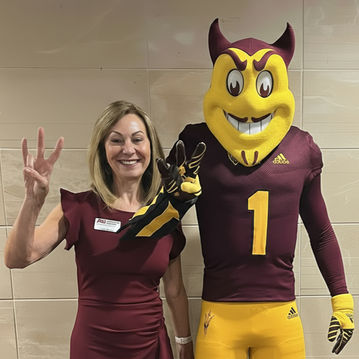 Julie Young with ASU mascot Sparky
